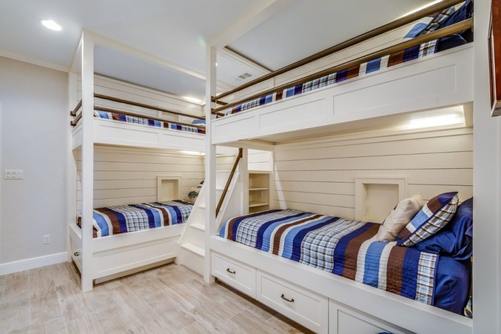Double bunk beds with stairs in white paint